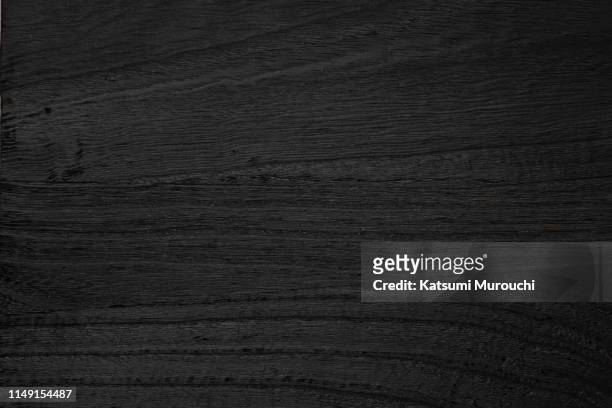 bkack wood board texture background - zwarte kleur stockfoto's en -beelden