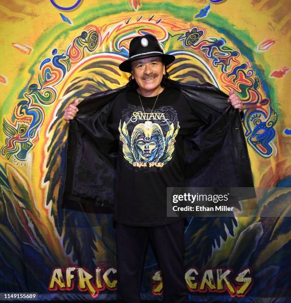 Recording artist Carlos Santana poses during a listening event for his upcoming album "Africa Speaks" featuring singer Buika at the House of Blues...