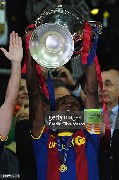 Eric Abidal of FC Barcelona lifts the trophy after victory in the UEFA Champions League final between FC Barcelona and Manchester United FC at...