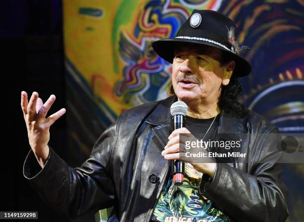 Recording artist Carlos Santana speaks during a listening event for his upcoming album "Africa Speaks" featuring singer Buika at the House of Blues...