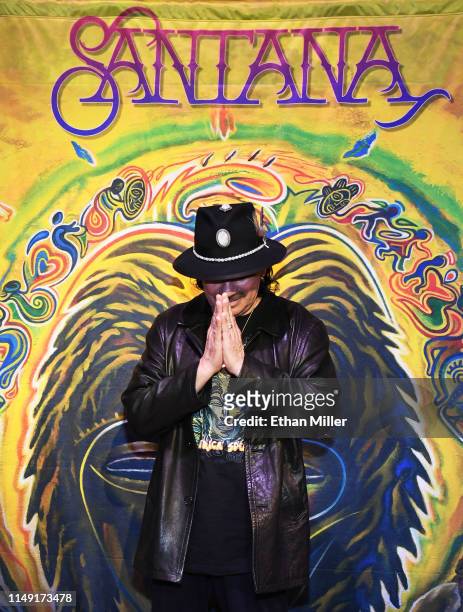 Recording artist Carlos Santana poses during a listening event for his upcoming album "Africa Speaks" featuring singer Buika at the House of Blues...