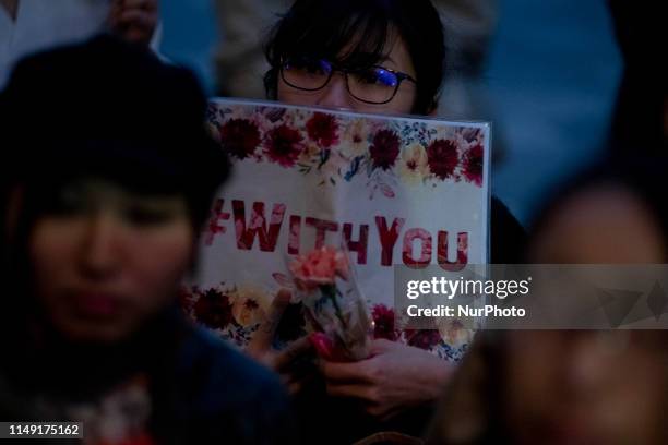 Protesters, about 150, gather at the rally called 'Flower Demo' to criticize recent acquittals in court cases of alleged rape in Japan and call for...