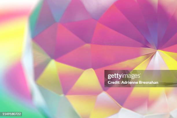 faceted crystal with pastel light effects - diamond gemstone stock pictures, royalty-free photos & images