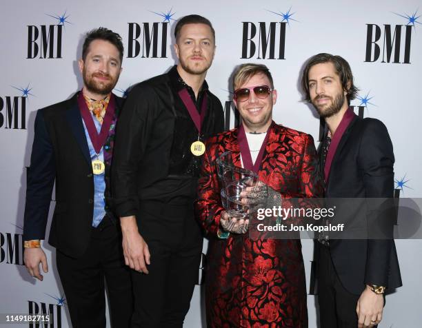 Daniel Platzman, Dan Reynolds, Ben McKee, and Wayne Sermon of Imagine Dragons attend the 67th Annual BMI Pop Awards at the Beverly Wilshire Four...