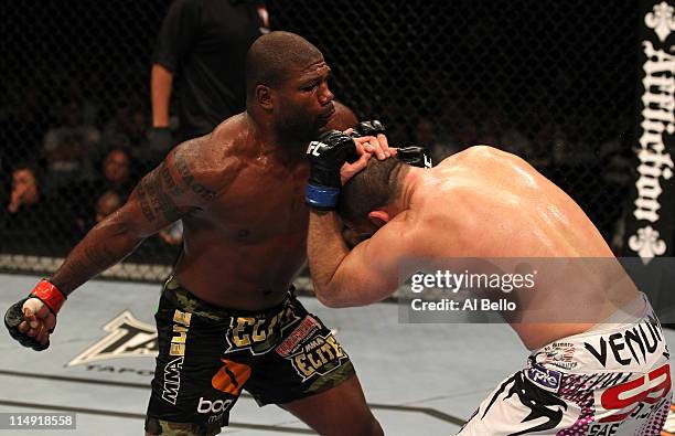 Quinton "Rampage" Jackson punches Matt Hamill during their light heavyweight fight at UFC 130 at the MGM Grand Garden Arena on May 28, 2011 in Las...