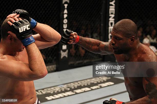 Quinton "Rampage" Jackson punches Matt Hamill during their light heavyweight fight at UFC 130 at the MGM Grand Garden Arena on May 28, 2011 in Las...