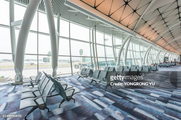hong kong international airport - empty gate stock-fotos und bilder