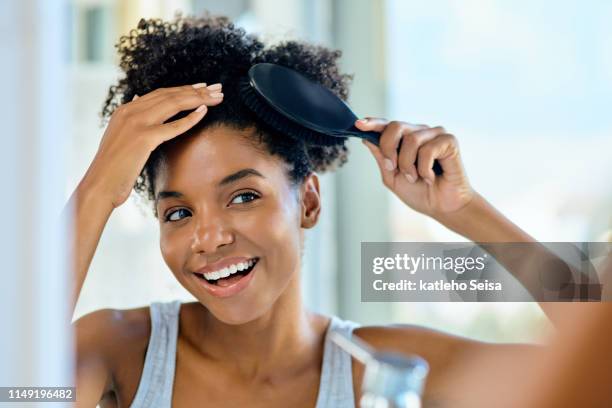 brushing her way to an awesome hair day - brushing hair stock pictures, royalty-free photos & images