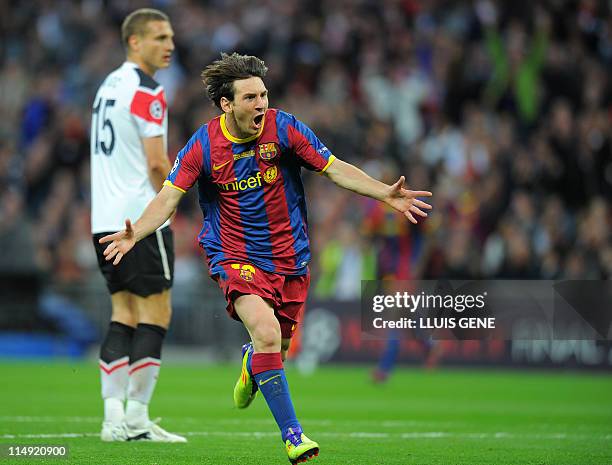 Barcelona's Lionel Messi celebrates after scoring against Manchester United during the UEFA Champions League final football match on May 28, 2011 at...