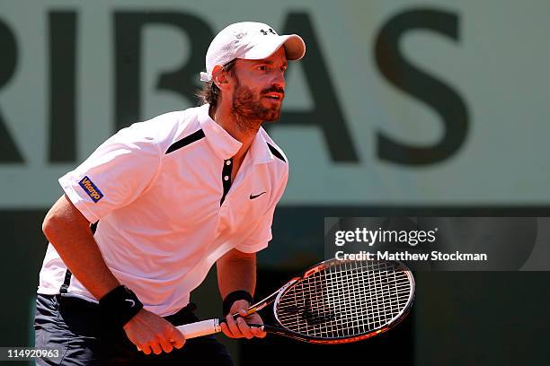 Christopher Kas of Germany in action during the men's doubles round three match between Christopher Kas of Germany and Alexander Peya of Austria and...