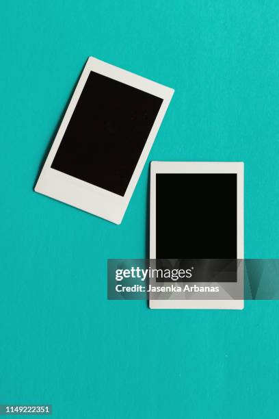 two blank instant print transfer - polaroids stock pictures, royalty-free photos & images