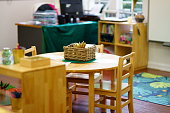 kindergarten education class room insde view include chairs and table