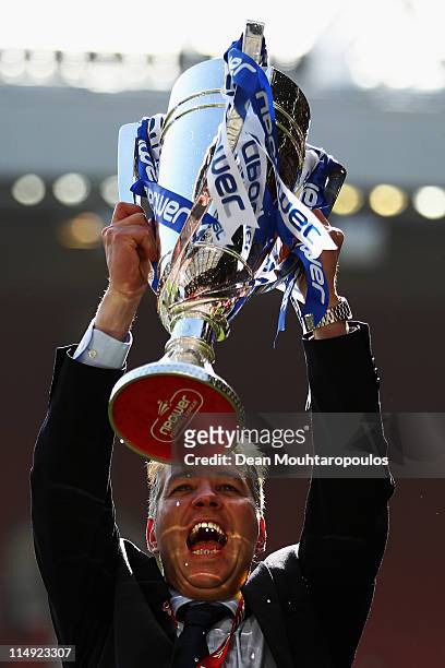 Peterborough Manager, Darren Ferguson celebrates with the trophy after winning the npower League One Play off Final between Peterborough United and...