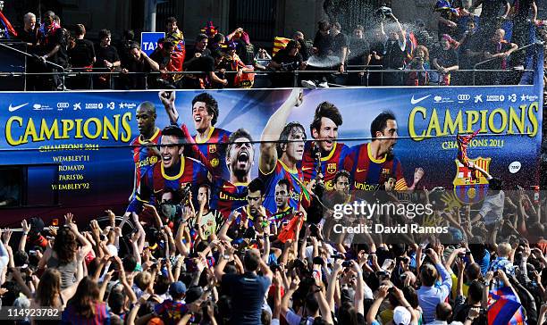 Barcelona players celebrate on board an open top bus after winning the UEFA Champions League Final against Manchester United, on May 29, 2011 in...