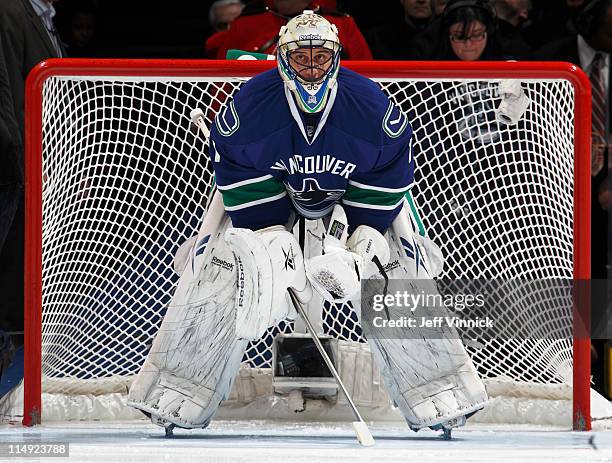 Roberto Luongo of the Vancouver Canucks looks on from his crease in Game Five of the Western Conference Finals during the 2011 NHL Stanley Cup...