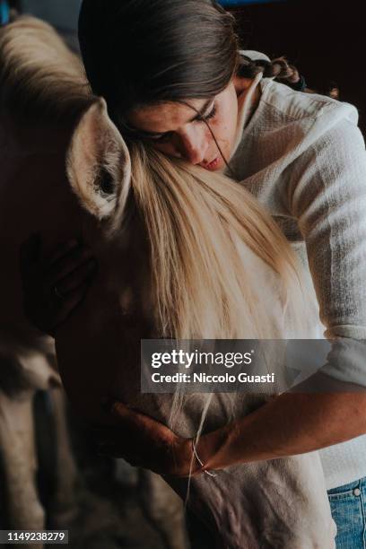 October 8: French 'rejoneadora' Lea Vicens is photographed for Self Assignment hugging one of her horses at 'Rancho El Rocio' on October 8, 2018 in...