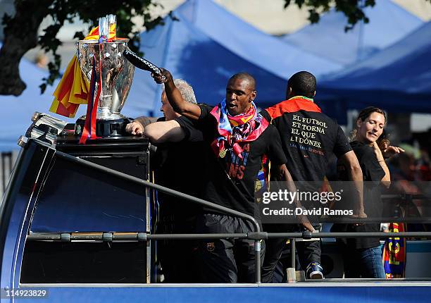 Eric Abidal of FC Barcelona celebrates on board an open top bus after winning the UEFA Champions League Final against Manchester United, on May 29,...