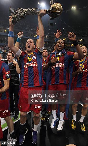 Iker Romero of Barcelona celebrates with the trophy after winning the EHF Final Four final match between FC Barcelona Borges and Ciudad Real at...