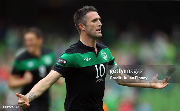 Robbie Keane of Republic of Ireland celebrates scoring the openning goal during the Carling Nations Cup match between Republic of Ireland and...