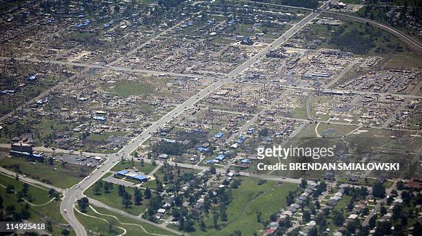 View of tornado damage as Air Force One carries US President Barack Obama to Joplin, Missouri, on May 29, 2011. The death toll stood at 142 one week...