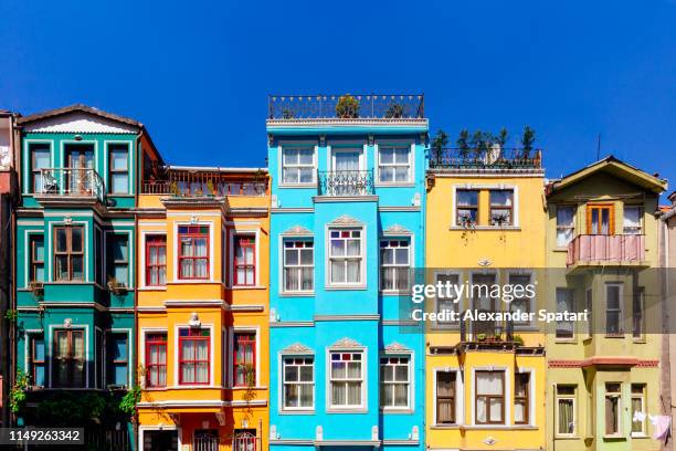 multicolored houses in a row on the street in istanbul - daily life in istanbul stock pictures, royalty-free photos & images