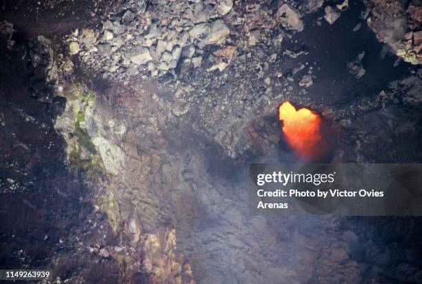 burning lava crater and fumaroles at the masaya volcano national park in nicaragua - masaya volcano fotografías e imágenes de stock