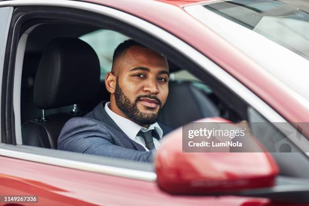 he's a confident driver - driver's seat stock pictures, royalty-free photos & images