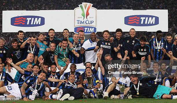 Javier Zanetti and Marco Materazzi with their FC Internazionale Milano teammates hold the trophy after the victory of Tim Cup final between FC...