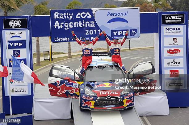 Sebastien Loeb of France and Daniel Elena of Monaco celebrate thir victory during Day3 of the WRC Rally Argentina on May 29, 2011 in Villa Carlos...