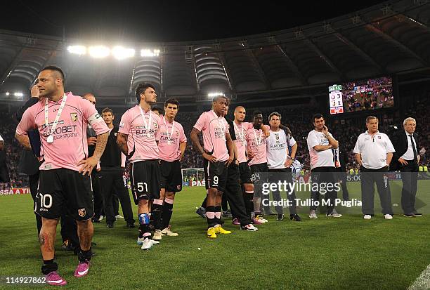Members of Palermo show their dejection after losing the the Tim Cup final between FC Internazionale Milano and US Citta di Palermo at Olimpico...