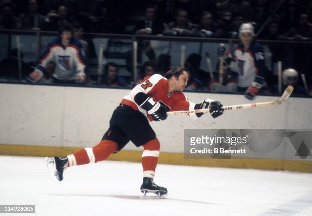 Bill Barber of the Philadelphia Flyers takes a slapshot during an NHL game against the New York Rangers on January 5, 1977 at the Madison Square...