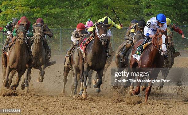 May 21:Shackleford, ridden by jockey Jesus Lopez Castanon, comes around turn four while running the Preakness Stakes at Pimlico Racetrack in...