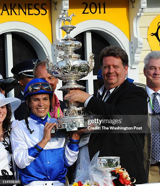 May 21: Shackleford Jockey Jesus Lopez Castanon hoists the trophy with trainer Dale Romansto after they won the 136th Preakness Stakes on May 21,...