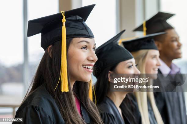 graduation day for multi-ethnic group - graduation 2019 stock pictures, royalty-free photos & images