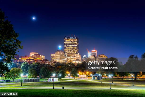 boston back bay skyline at night from the boston common hill, massachusetts, usa. - look back at garden cities stock-fotos und bilder