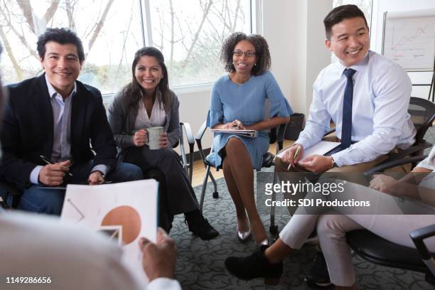 diverse group of people meet to discuss growth - native korean stock pictures, royalty-free photos & images