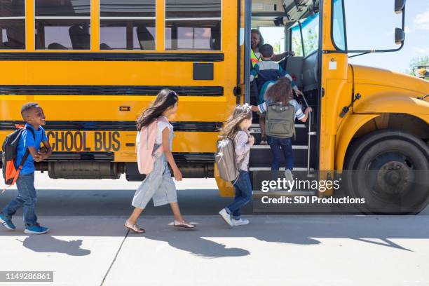 Bus Loading Man 154 Loading School Bus Stock Photos, High-Res Pictures, and Images ...