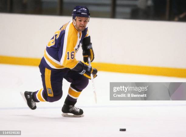 Marcel Dionne of the Los Angeles Kings skates with the puck during an NHL game circa 1981.