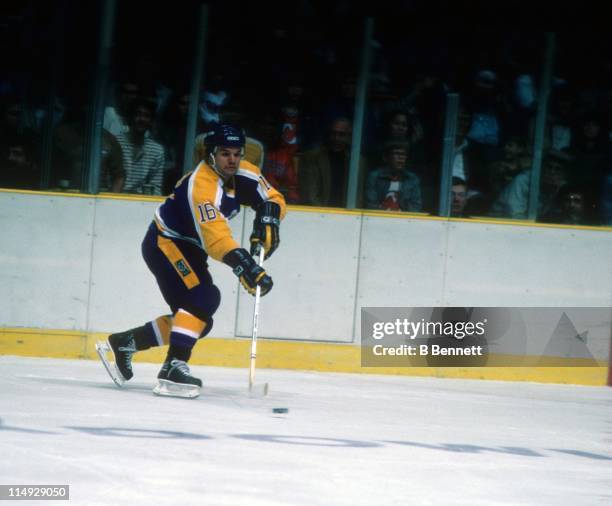 Marcel Dionne of the Los Angeles Kings skates with the puck during an NHL game against the New Jersey Devils on February 21, 1985 at the Brendan...