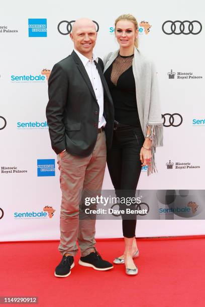 Matt Dawson and Carolin Hauskeller arrive at the Audi Sentebale Concert at Hampton Court Palace on June 11, 2019 in London, England.