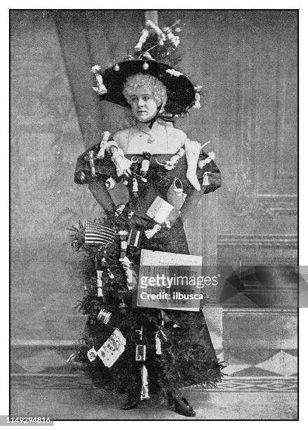 stockillustraties, clipart, cartoons en iconen met antieke foto: actrice nita carlyon als een kerstboom - men costume black and white