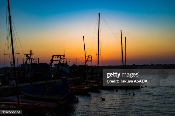 sunset at beach in old jaffa - テルアビブ stock pictures, royalty-free photos & images