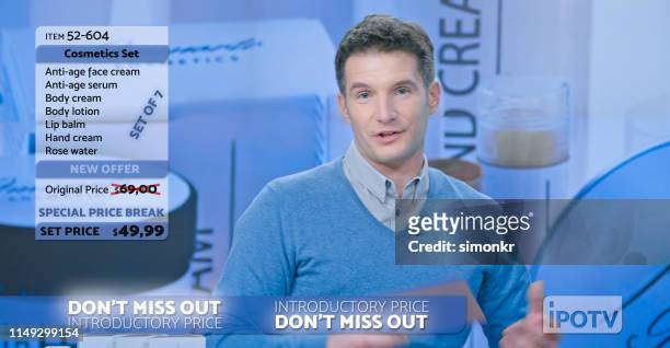 man standing in studio - anúncio de televisão imagens e fotografias de stock