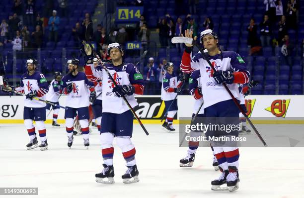 Team members of Great Britain celebrate after the 2019 IIHF Ice Hockey World Championship Slovakia group A game between United States and Great...