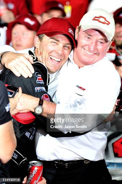 Kevin Harvick , driver of the Budweiser Armed Forces Tribute Chevrolet, hugs team owner Richard Childress in Victory Lane after winning the NASCAR...