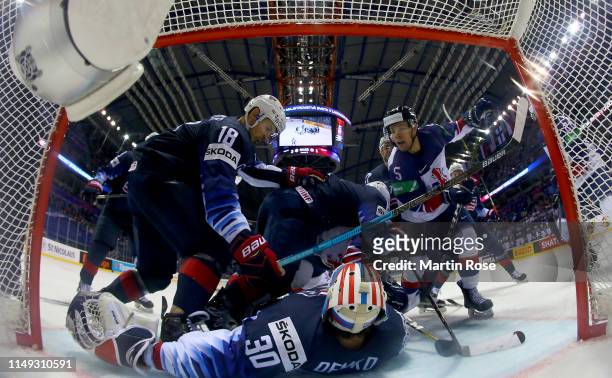 Thatcher Demko, goaltender of United States tends net against Ben Davies Great Britain during the 2019 IIHF Ice Hockey World Championship Slovakia...