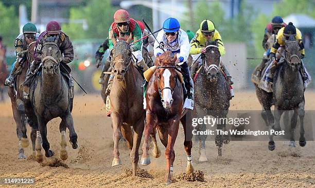 May 21: Shackleford with Jockey Jesus Lopez Castanon on board crosses the finish line to win the 136th Preakness Stakes with Kentucky Derby winner...