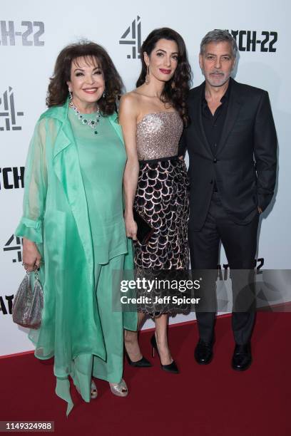 Baria Alamuddin, Amal Clooney and George Clooney attend the "Catch 22" UK premiere on May 15, 2019 in London, United Kingdom.