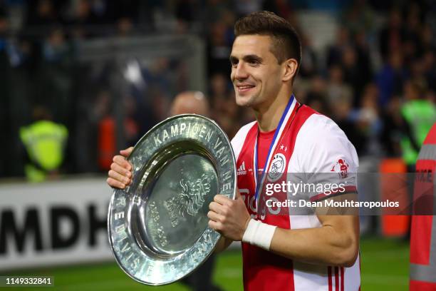 Dusan Tadic of Ajax celebrates with the trophy after winning the Eredivisie following the Eredivisie match between De Graafschap and Ajax at Stadion...