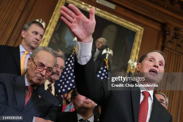 Sen. Ron Wyden and Senate Minority Leader Charles Schumer lead a rally and news conference ahead of a House vote on health care and prescription drug...